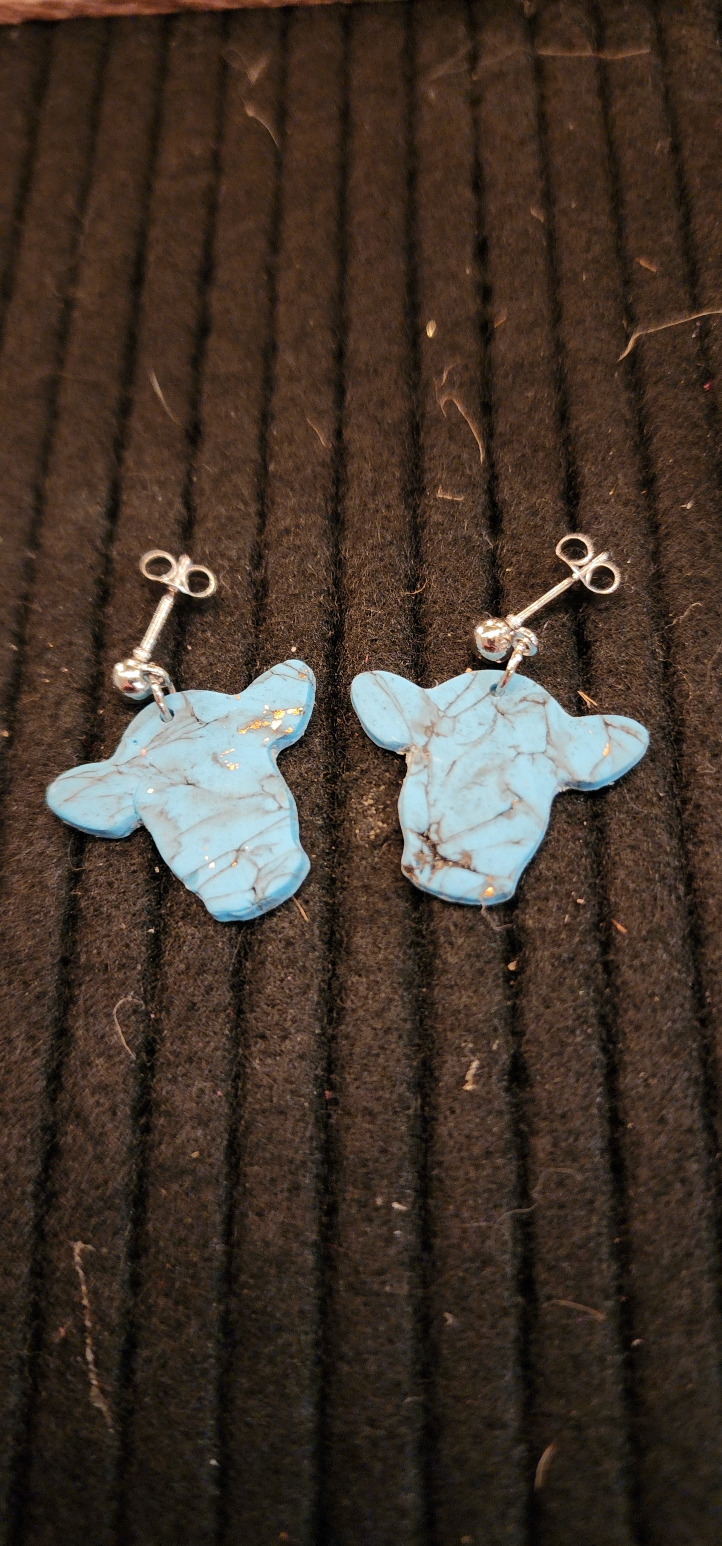 Cow stud dangle
