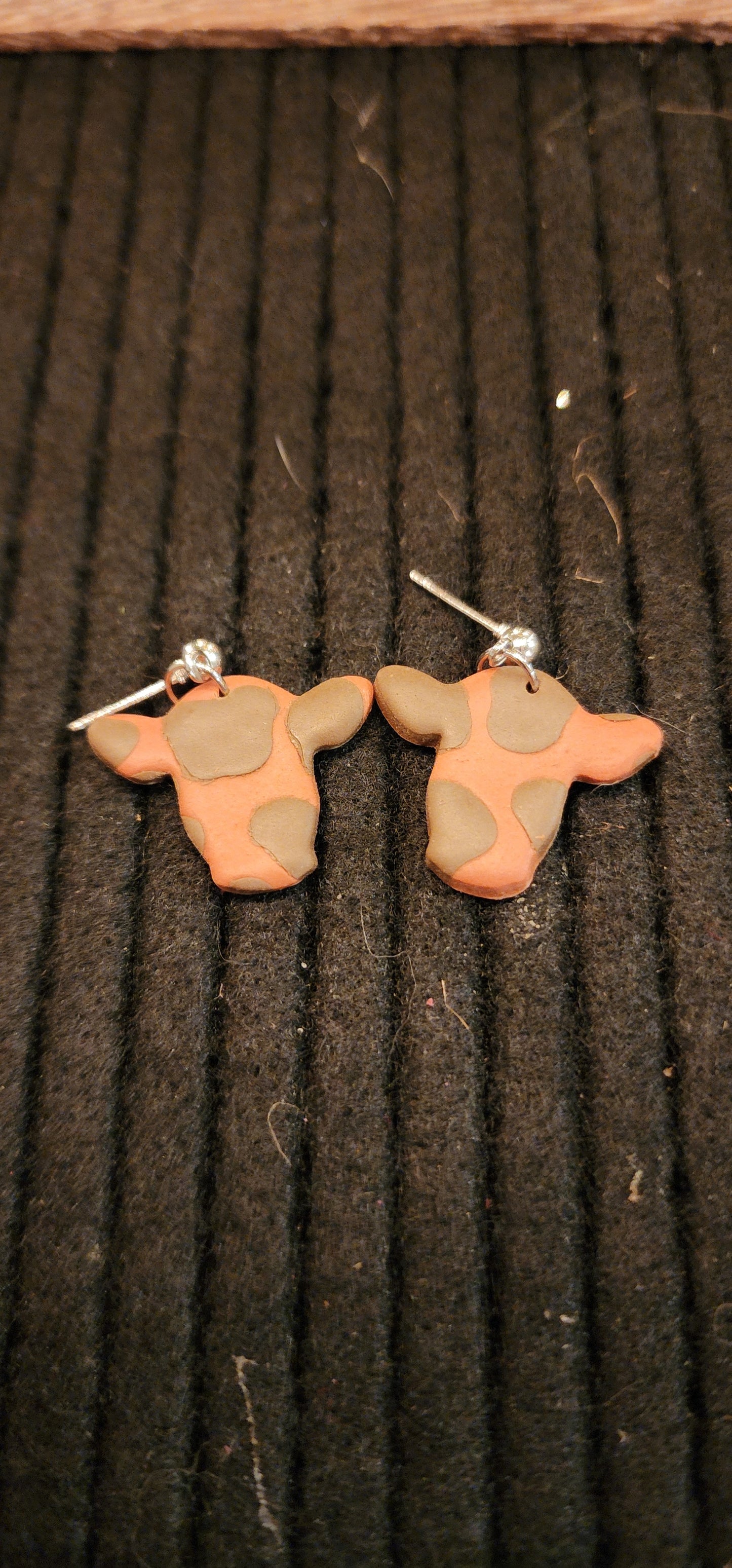 Cow stud dangle