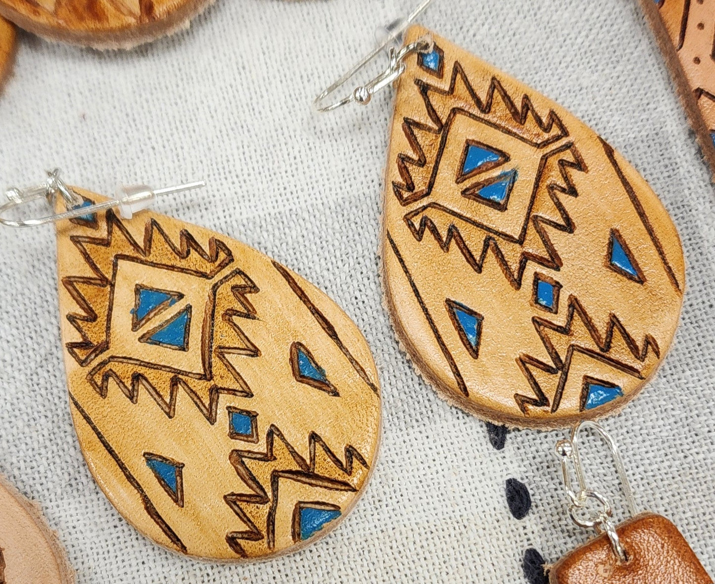 Tear drop leather dangle